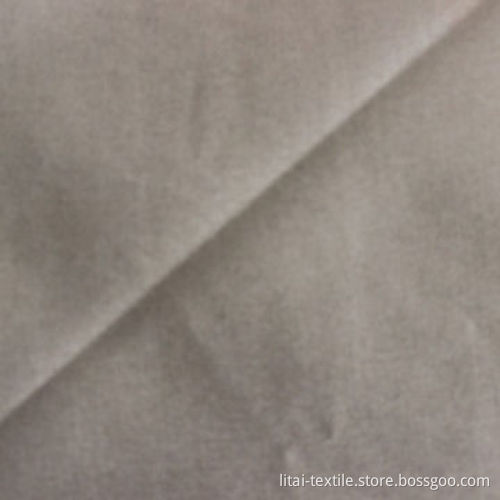 73% polyester, 2% cotton, T400 poly and cotton interweave fabric, plain